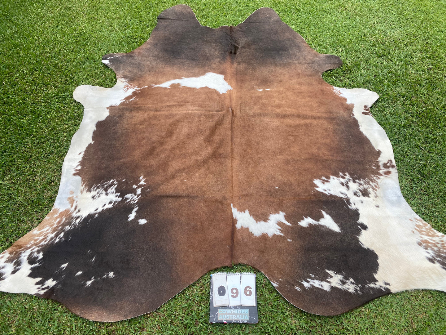 96: Black white with reddish flecks Cowhide