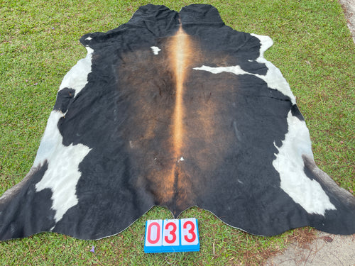 33. Black White Red Cowhide