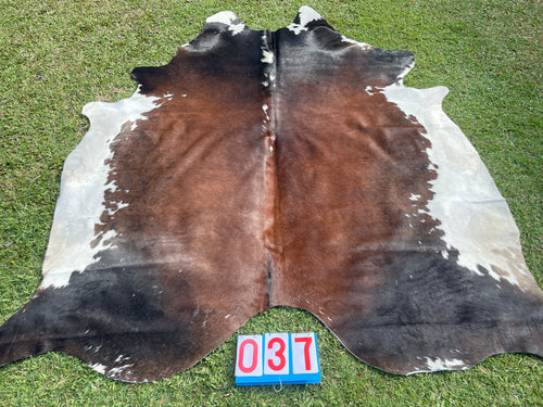 37. Red Black White Cowhide