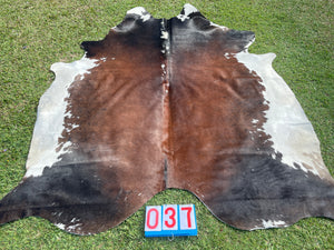 37. Red Black White Cowhide