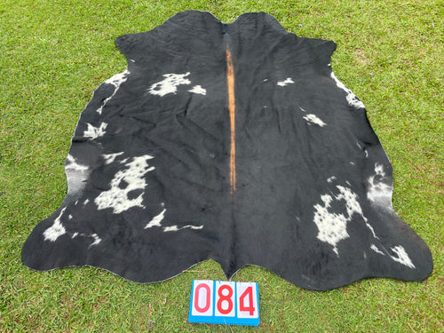 84. Black White Reddish Cowhide