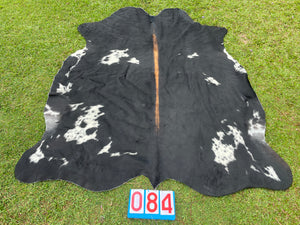 84. Black White Reddish Cowhide