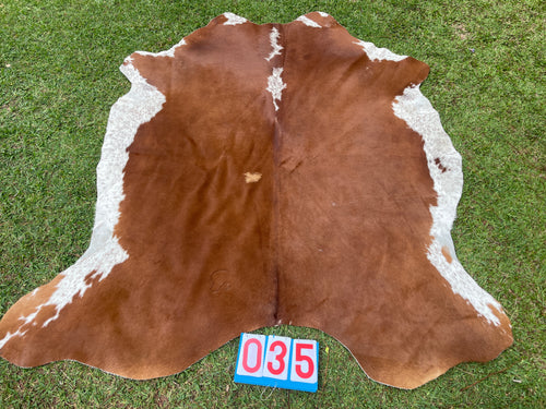 35. Tan and White Cowhide