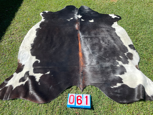 61. Black White Reddish Cowhide