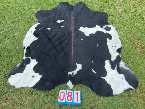81. Black White Reddish Cowhide