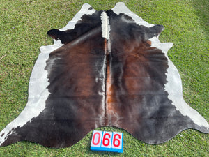 66. Brown White Reddish Cowhide