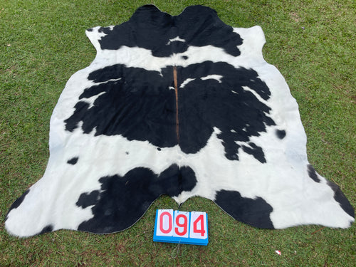 94. Black White Red Cowhide