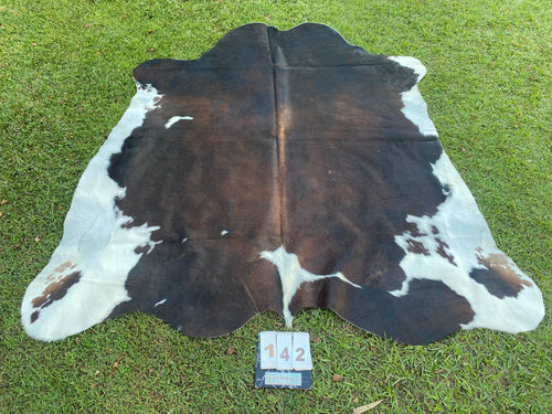 a142 Black white reddish Cowhide