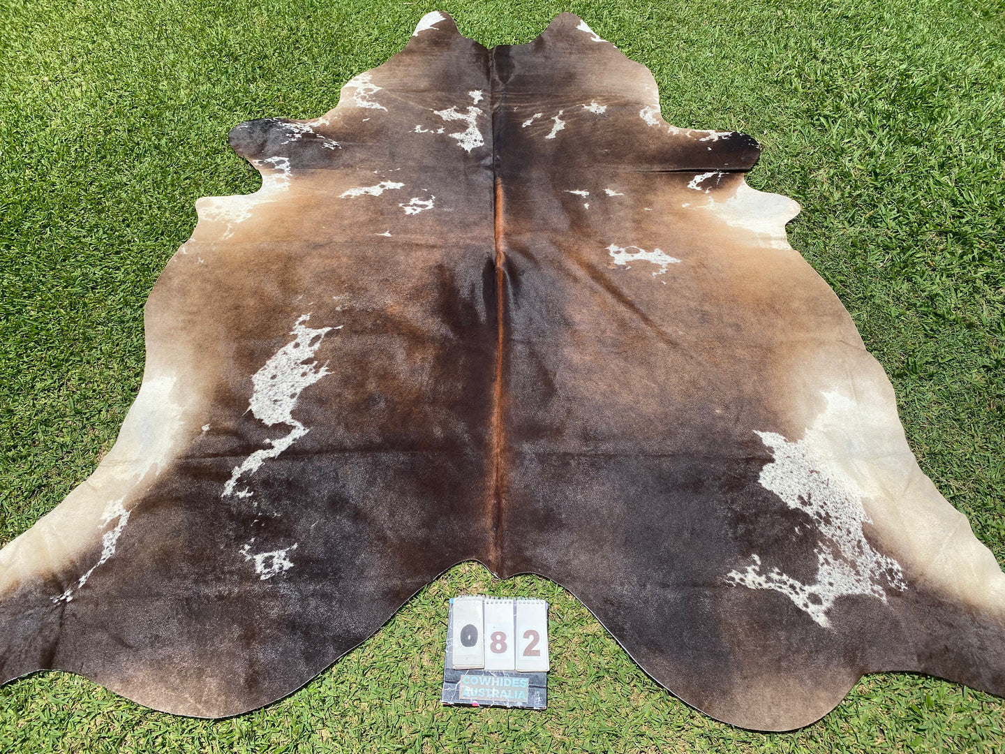 82. Black White Reddish Speckled Cowhide