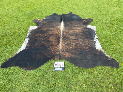 57. Black White Reddish Cowhide