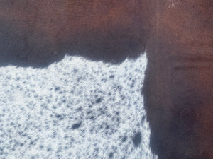 a195. Red Black and White speckled Cowhide