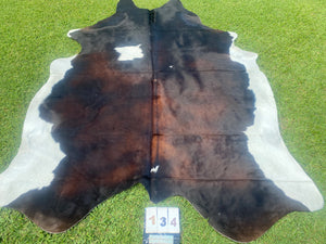 a134. Black White Reddish Cowhide