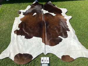 99. Black White Reddish Cowhide