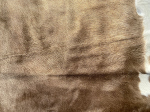 a168. Mocha and White Cowhide