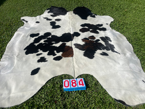 84. Black white reddish Cowhide