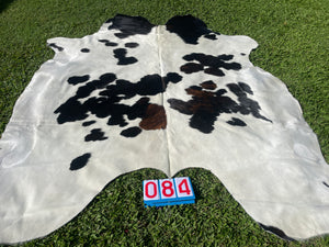 84. Black white reddish Cowhide