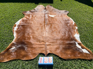 a136. Brown and White Cowhide
