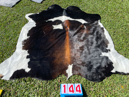 a144. Black White Reddish Cowhide