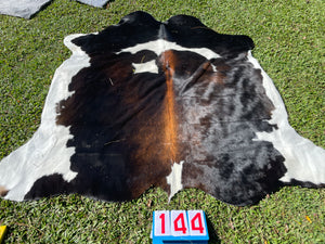 a144. Black White Reddish Cowhide