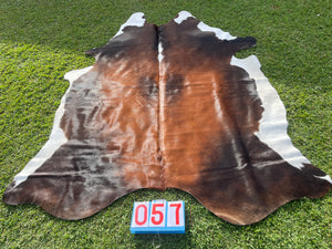 57. Black White Reddish Cowhide