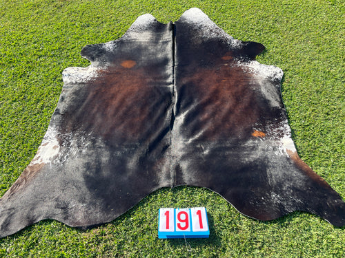a191. Black Reddish and White Cowhide