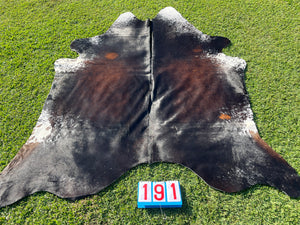 a191. Black Reddish and White Cowhide