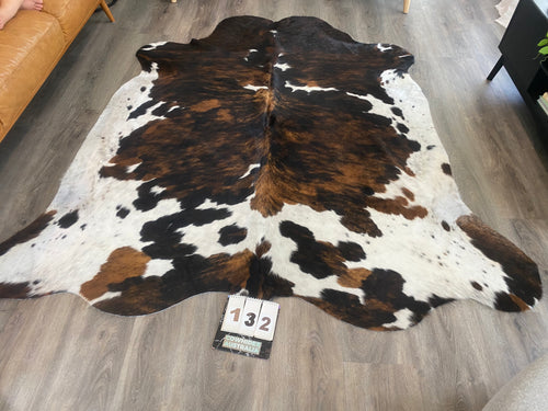 a132. Black White Reddish Cowhid